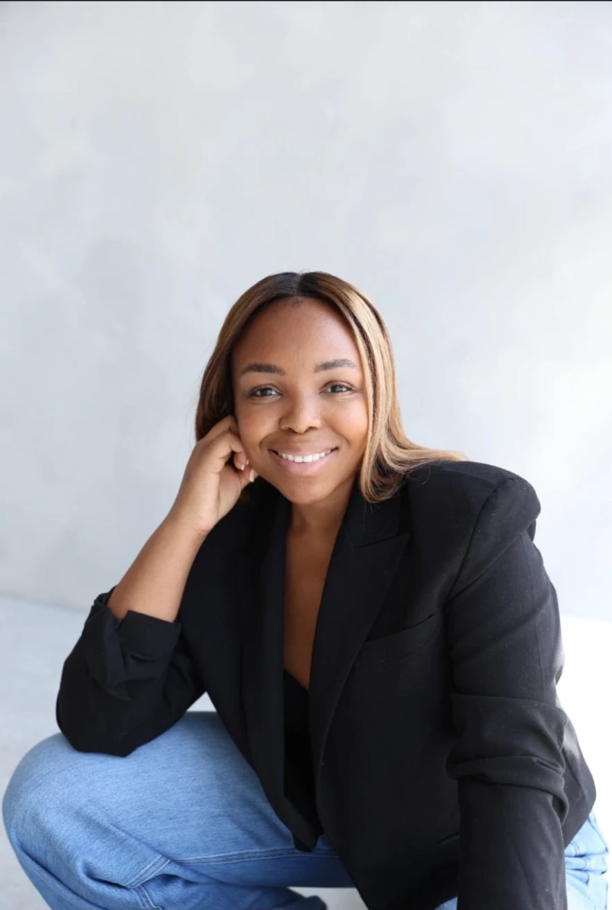 Tomi speaking at an Elite Business Academy session
